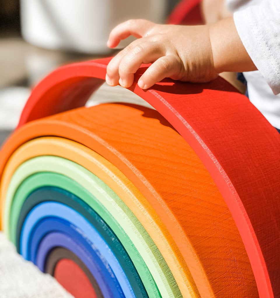 montessori rainbow with child playing and learning